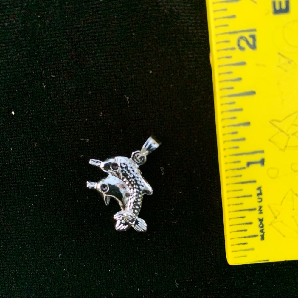Charming Silver Tone Dolphin Pendant